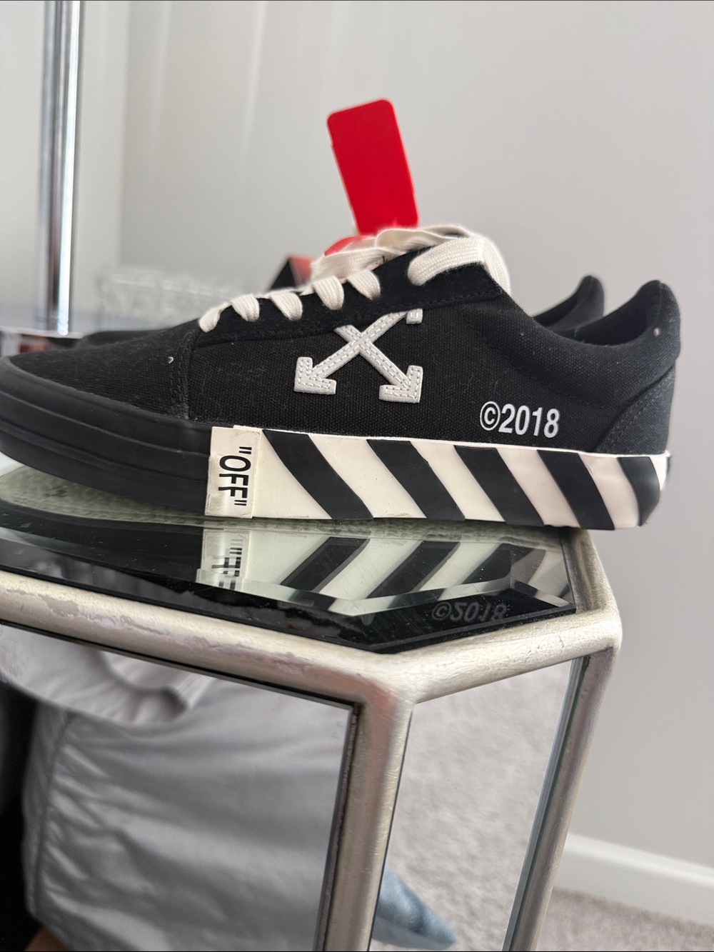 Off-White Black Canvas Low-Top Sneakers with White Arrow and Striped Midsole